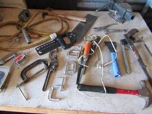 lot 284 image: Large tool lot- hammers, plyers, scrapers. Wrenches, hand saws, clamps and more