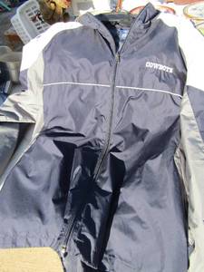 lot 303 image: Size large Dallas cowboys windbreaker and size large Dallas cowboys leather jacket