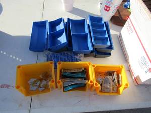 lot 314 image: Box FULL of yellow plastic tool caddies containing hinges, locks, screws and lots more plus a NEW blue tool caddy