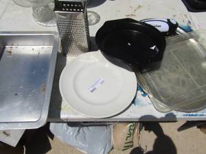 lot 323 image: Muffin pans, 3 hedge rose white plates, metal roast pans, cheese grater, can opener, 14 silver serving platter