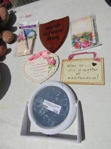 lot 328 image: hand mirror, notepad with pen and 2 NEW worlds greatest mother signs