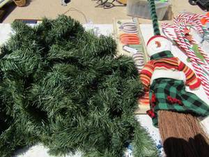 lot 333 image: Green christmas garland snowman broom,  6 yard art candy canes, ball yard lights