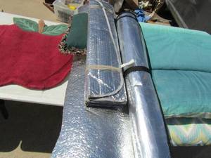lot 358 image: Assorted pillows, Patio furniture seating, sunblock for cars, doorway rugs and more
