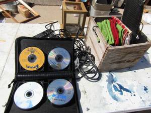 lot 361 image: Wooden box full of hand towels, dish towels, Motorola phone charger, Vizio TV remote, CD holder, shadow box and more