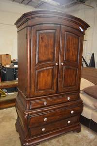 lot 16 image: 2-Piece Armoire Dresser with what looks like cedar bottomed drawers, top drawer felt (46W x 29D x 7 Ft. Tall)