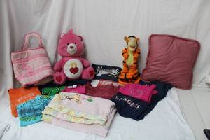 lot 85 image: Kids Lot Bouncing Tigger, Care Bear, Kids Clothes