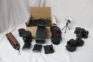 lot 93 image: Camera and Lens Konica, Canon, Kodak PLUS Memorex DVDCD Player