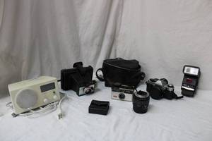 lot 94 image: Camera and Electronics Alarm Clock, Poloroid, Kodak, Canon