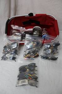 lot 95 image: Kids Sunglasses still with Tags and Sports Wrist Bands