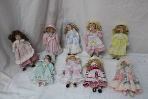 lot 97 image: 4 Porcelain Doll Collection