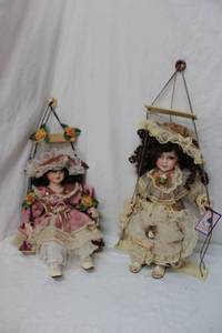 lot 99 image: Swinging Porcelain Dolls 14 approx.