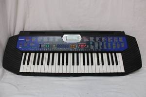 lot 104 image: Casio Keyboard CTK-411