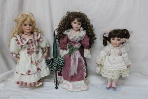 lot 120 image: Three Porcelain Dolls with Umbrella (Dolls 14 Approx.)