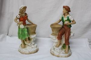 lot 148 image: Boy and Girl Figurines marked Universal Statuary Chicago, Ill. 197.5
