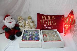 lot 70 image: Christmas Dcor Plush Santa and Snowmen, Glass Ornaments, Merry Texmas yall Pillow still with tags and Lit-up Ornament Decoration