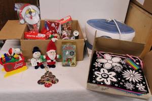 lot 219 image: Christmas Decorating Items, Birthday Color-It-Yourself Gift Bags, Homedics WarmerMelter