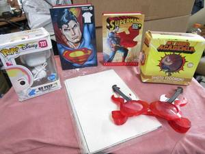 lot 146 image: COLLECIBLE FUNKO POP BO PEEP, COLLECTIBLE SUPERAN TINS, COLLECTIBLE FUNKO SHOTO TODOROKI, COLLECTORS SUPERMAN POSTERS, FUN GUITAR LIGHT UP SUNGLASSES.