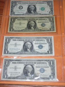 lot 16 image: (2) $1 SILVER NOTES SERIES 1957, (1) $1 SILVER NOTE SERIES 1957 A, (1) SERIES 1963 $1 BANKNOTE