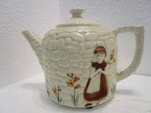 lot 81 image: VINTAGE PORCELIER COBBLESSTONE TEAP POT WHAND PAINTED GIRL &amp FLOWERS