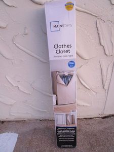 lot 151 image: PORTABLE CLOTHES CLOSET NEW IN BOX