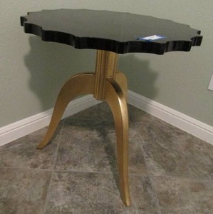 lot 35 image: CONTEMPORARY OCCASIONAL TABLE BLACK NOTCHED TOP WITH GOLD TRI LEG BASE