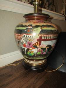 lot 30 image: ASIAN MOTIF TEMPLE JAR TURNED LAMP 29 BY 12 BLACK SHADE