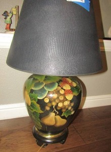 lot 42 image: TABLE LAMP BLACK BASE WITH FRUIT DESIGN 31 IN BY 12 IN