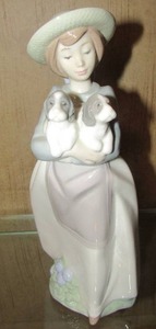 lot 49 image: LLADRO NAO DAISA 1991 GIRL WITH PUPPIES 10 INCHES