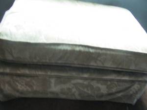 lot 85 image: GREEN DAMASK UPHOLSTERED OTTOMAN 34 BY 24 BY 16