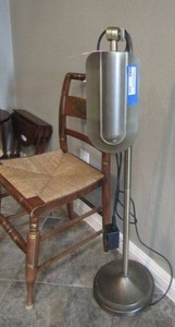 lot 102 image: VERILUX BED SIDE FLOOR LAMP AND BROWN WICKER SEATING ACCENT CHAIR WITH FRUIT DESIGN 34 12 BY 17 12 BY 17 12