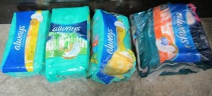 lot 110 image: OPENED AND UNOPENDED PACKS OF LADIES Feminine PRODUCTS