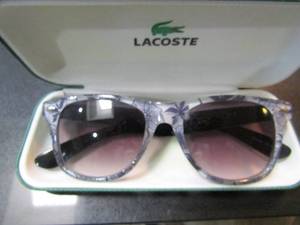 lot 143 image: LACOSTE BRANDED CASE  &  PAIR OF SALLY SUNGLASSES TROPICAL