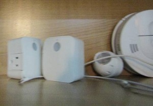 lot 137 image: CHARGING BLOCK 2 CORDS PLUG IN LIGHTS TIMES 2 FIRE ALARM