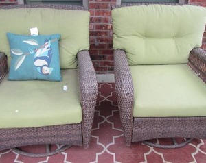 lot 151 image: 2 SWIVEL ROCKING WICKER PATIO CHAIRS  WITH GREEN CUSHIONS