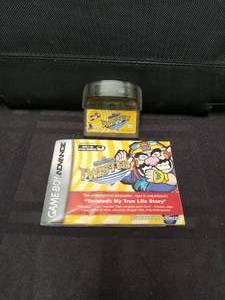 lot 110 image: Nintendo Game Boy - Wario Ware Twisted game and manual - no box