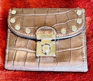 lot 23 image: Dooney & Bourke Genuine Crocodile Skin Leather Wallet