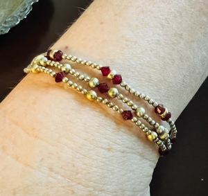 lot 105 image: Silver .925 Three Strand Red Gemstone Bracelet