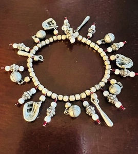 lot 106 image: Sports Charm Bracelet