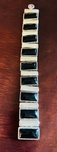 lot 109 image: Black & Silver Bracelet