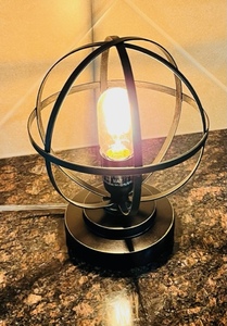 lot 190 image: Globe Shaped Metal Lamp