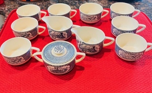 lot 237 image: Currier & Ives Horse & Carriage - 9 Tea Cups2 CreamersSugar Bowl Set