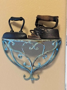 lot 304 image: Antique Irons On Blue Rustic Iron Shelf