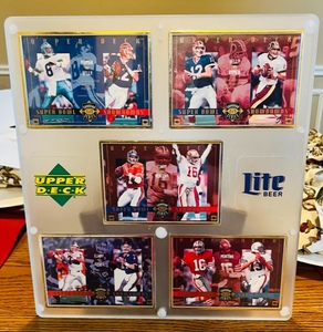 lot 389 image: Framed Upper Deck Lite Beer Super Bowl Show Down Series Complete set of 5