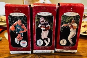lot 391 image: Hallmark Keepsake Ornaments Grant Hill, Emmitt Smith, Cal Ripken Jr.