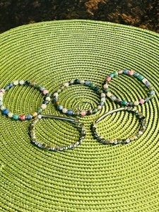 lot 433 image: Five Beaded Bracelets Pastel Rainbow & Silver