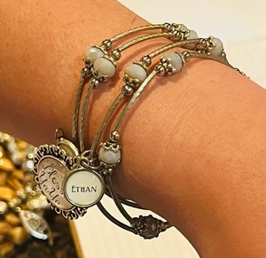 lot 434 image: Wrap Around White Stone Charm Bracelet