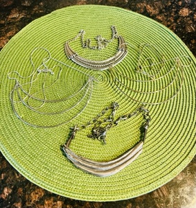 lot 438 image: Four Silver & Gold Crescent Disc Drop Down Necklaces