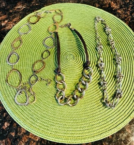 lot 441 image: Three Silver Hoops & Leather Necklaces