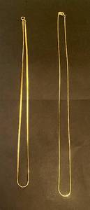 lot 29 image: 2 Gold Colored Necklaces
