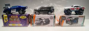 lot 102 image: Matchbox premier Retro 70s Collection Pi-Eyed Piper 1972 2015 Cadillac Escalade 68 Mustang